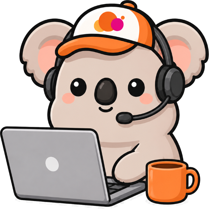 Kip, the Worktopia koala, working at a laptop with a coffee
